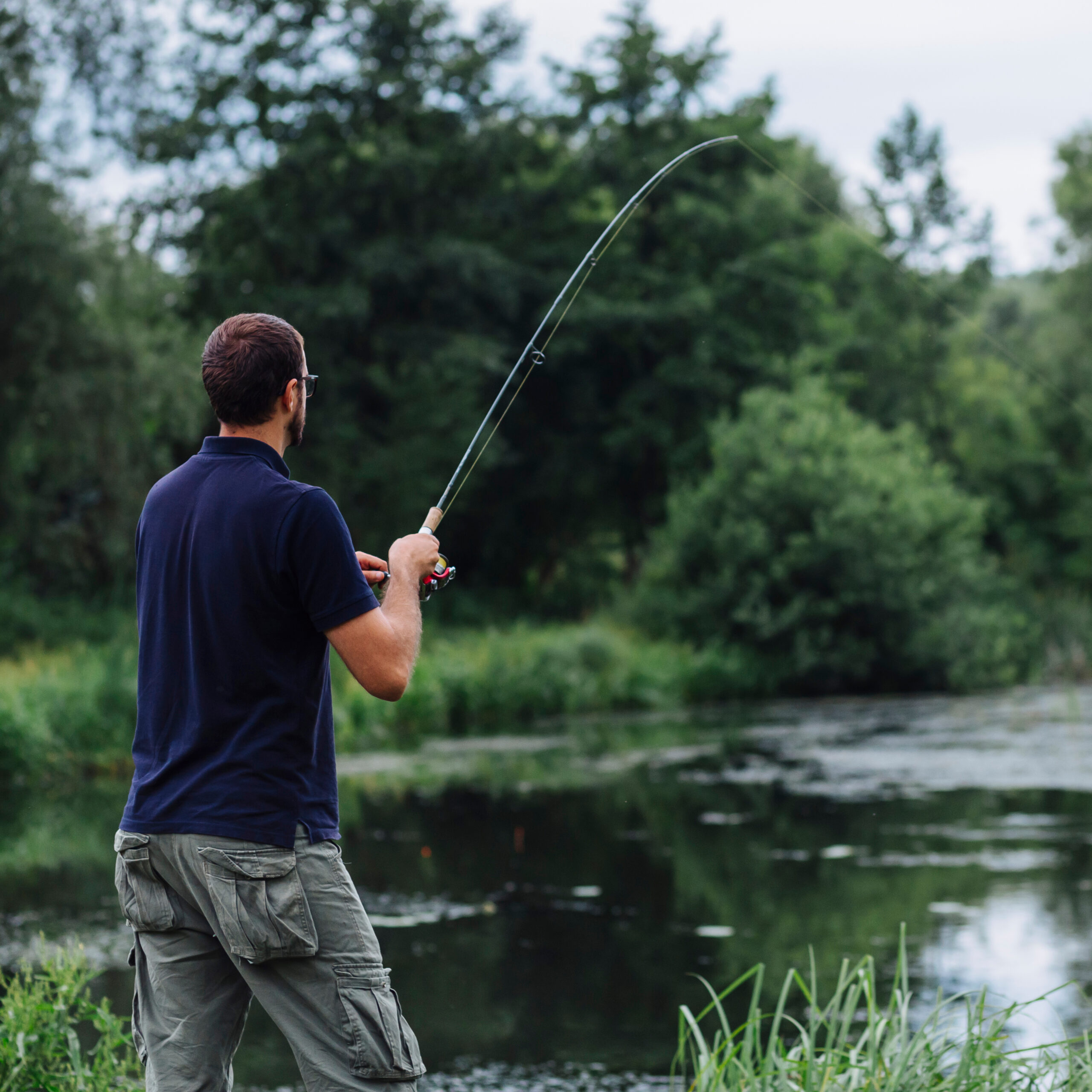 close-up-man-fishing-lake